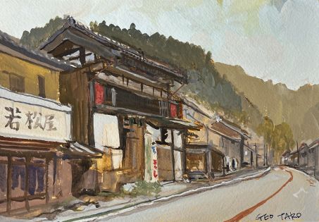 秩父街道吾野宿の黒い長屋門と白い医院建築